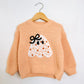 RTS 2T peach sweater w/ daisy ghost