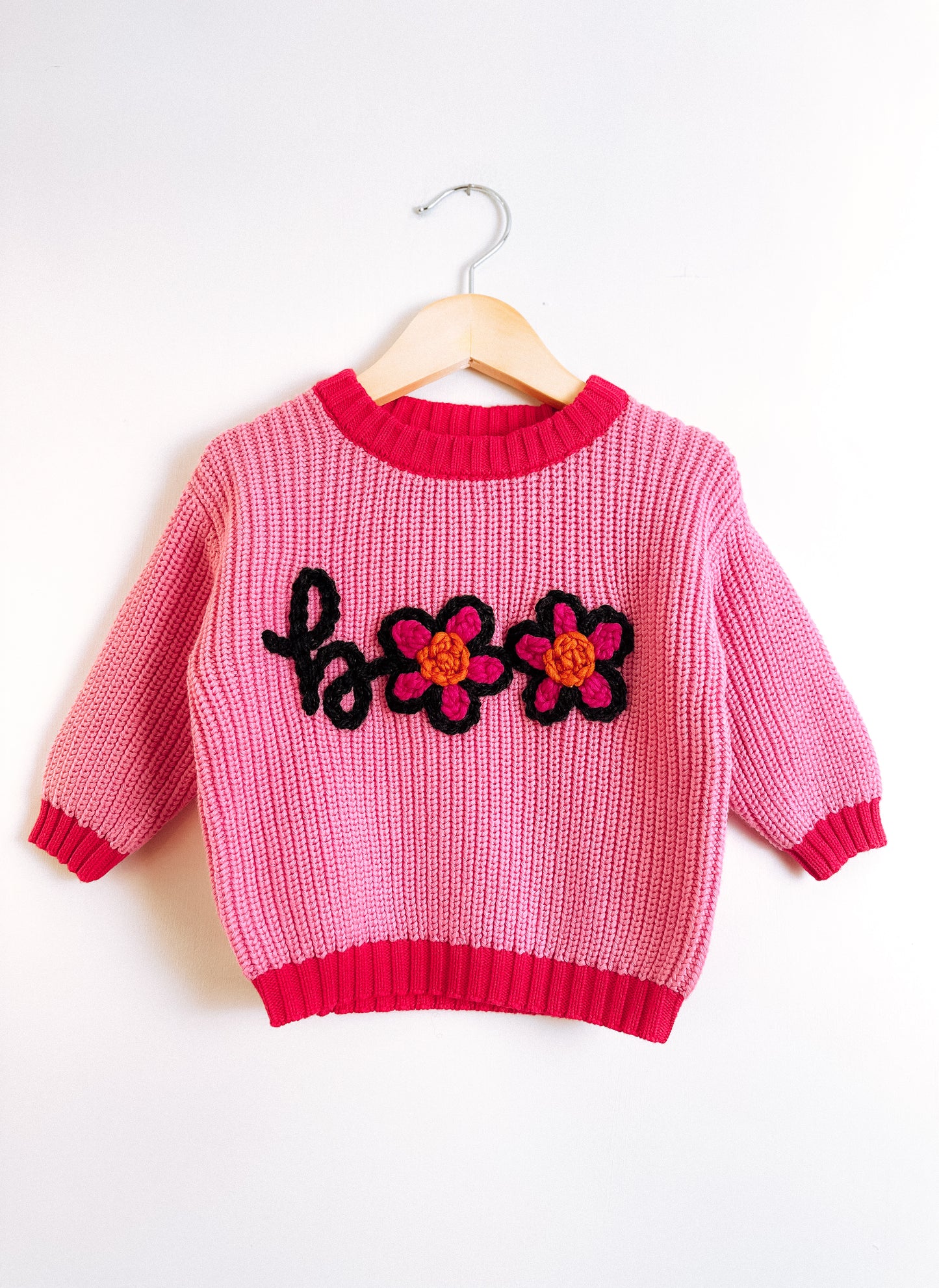 RTS 3-6 mo. bubblegum sweater w “boo”